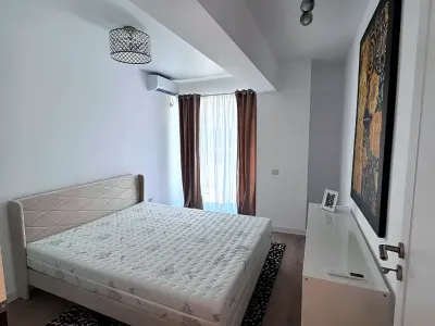dormitor primitor cu pat inchiriere apartament Sector 5 București